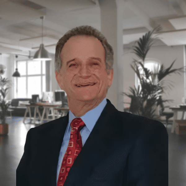 A man in suit and tie standing inside of an office.