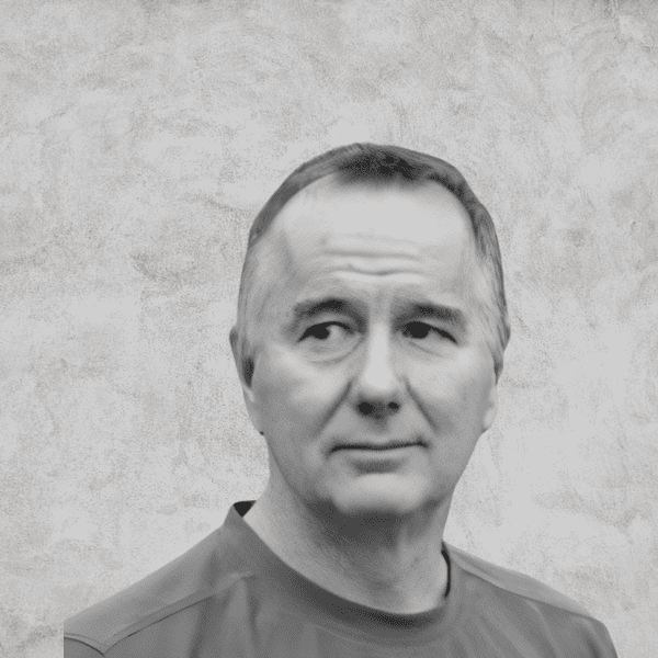 A man with short hair and a beard.