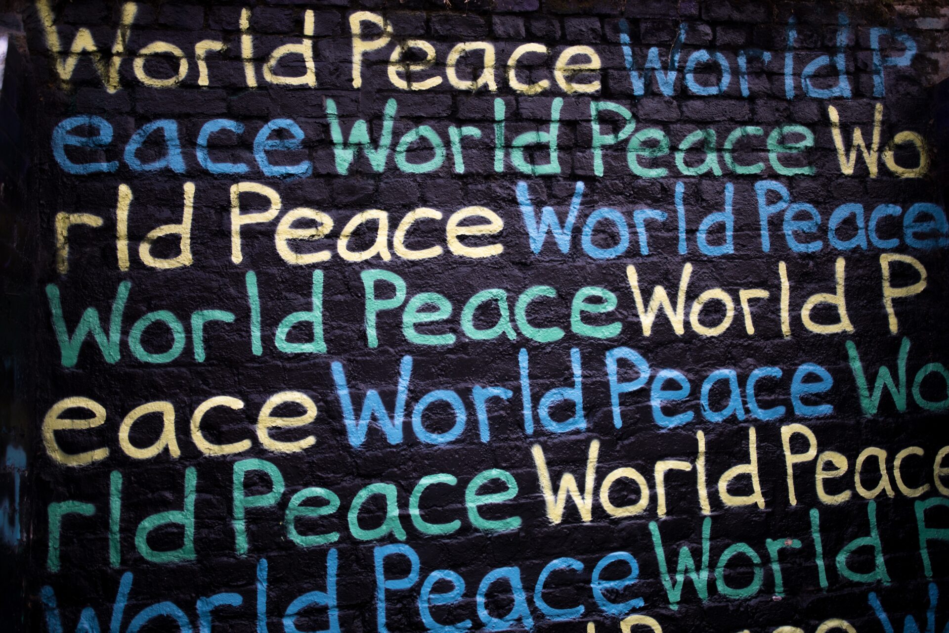 world peace written on a wall
