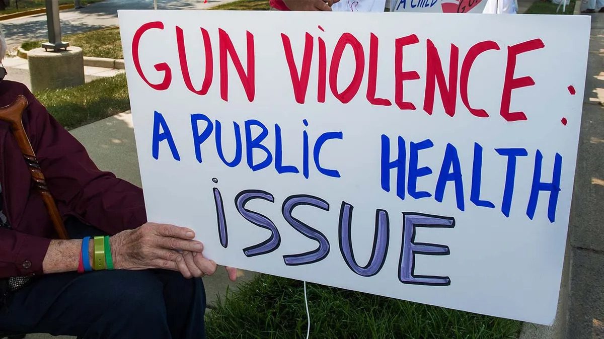 gun violence a public health issue placard
