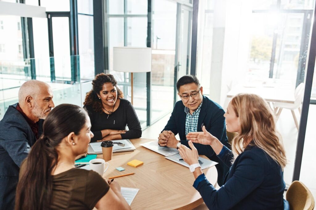 A group of people discussing and talking to each other