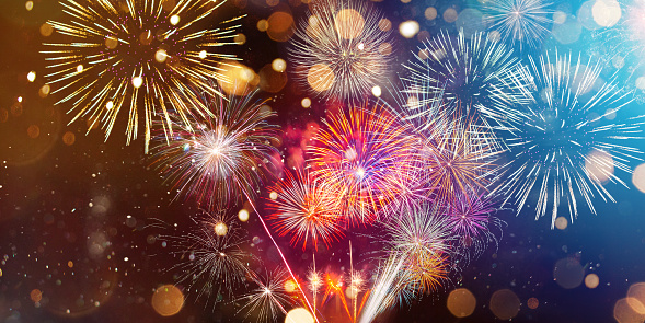 Colorful firework with bokeh background.