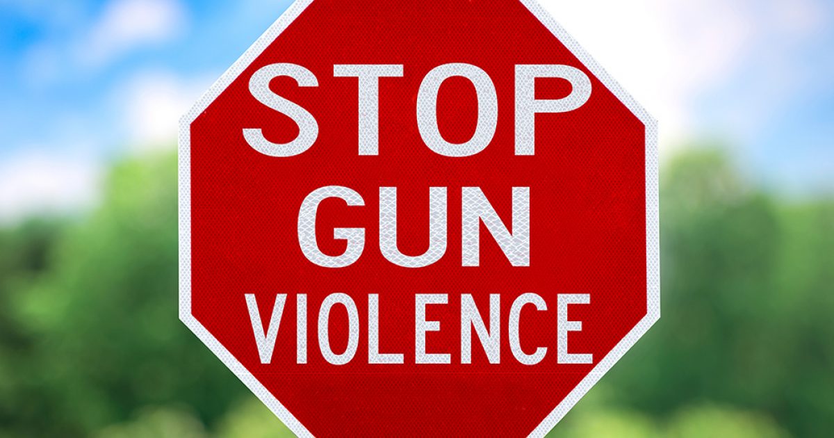 A road sign for stopping gun violence