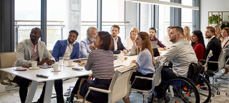 A group of people sitting at a table.