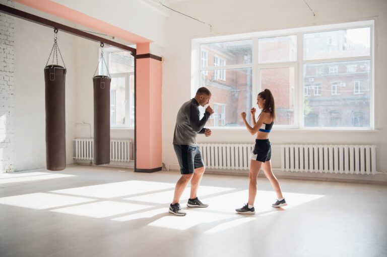 In a spacious loft, two work colleagues are fighting.