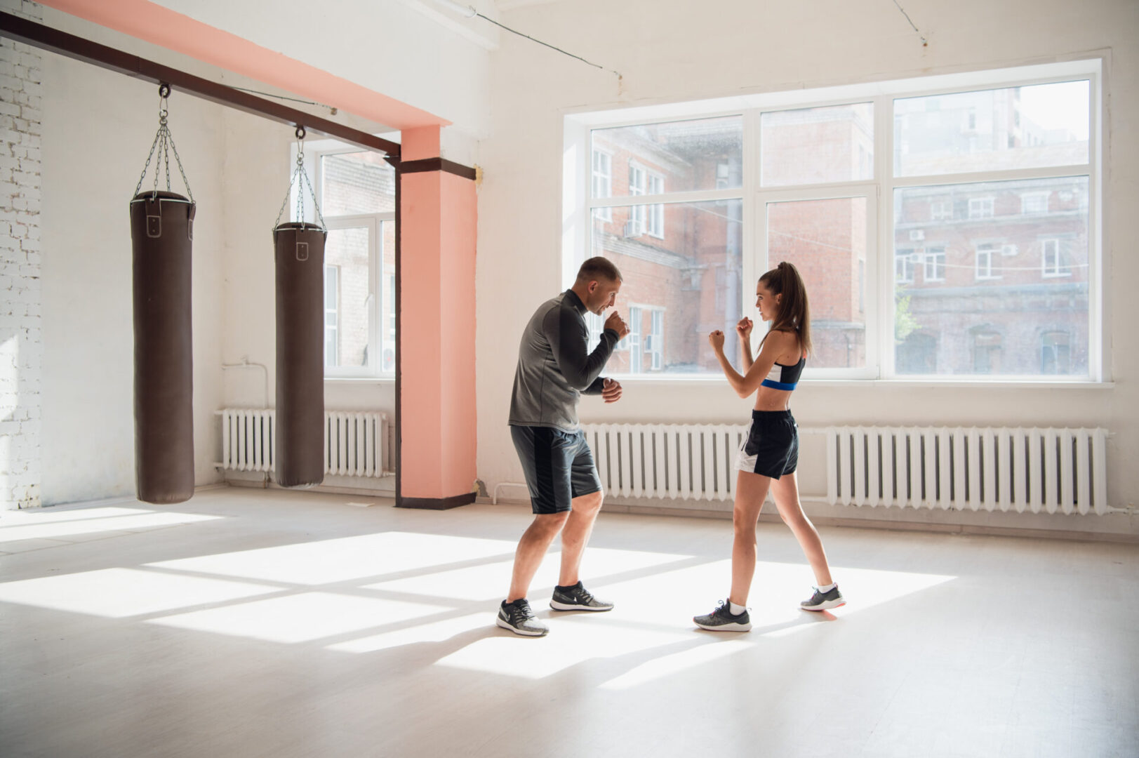 In a spacious loft, two strong leaders are fighting.
